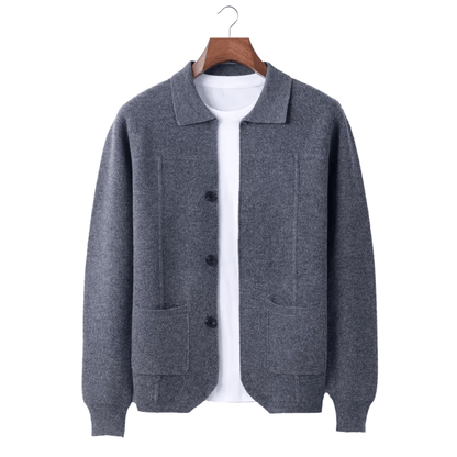 Gray cardigan on a hanger with a white shirt underneath