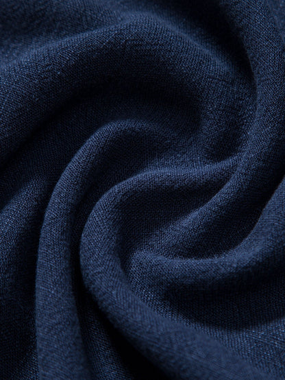 Close-up of dark blue fabric with visible texture