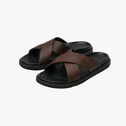 Men's brown NAXOS cross-strap sandal featuring a sleek minimalist design and contoured EVA footbed.