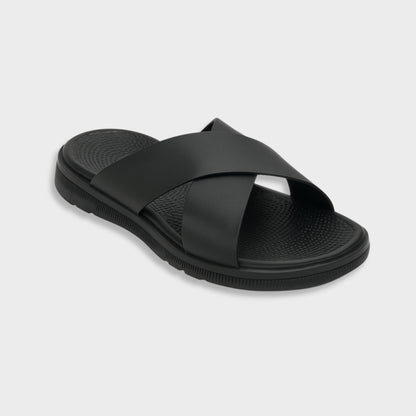 Classic black luxury EVA cross sandal for men, showing the modern silhouette and flexible flat sole.