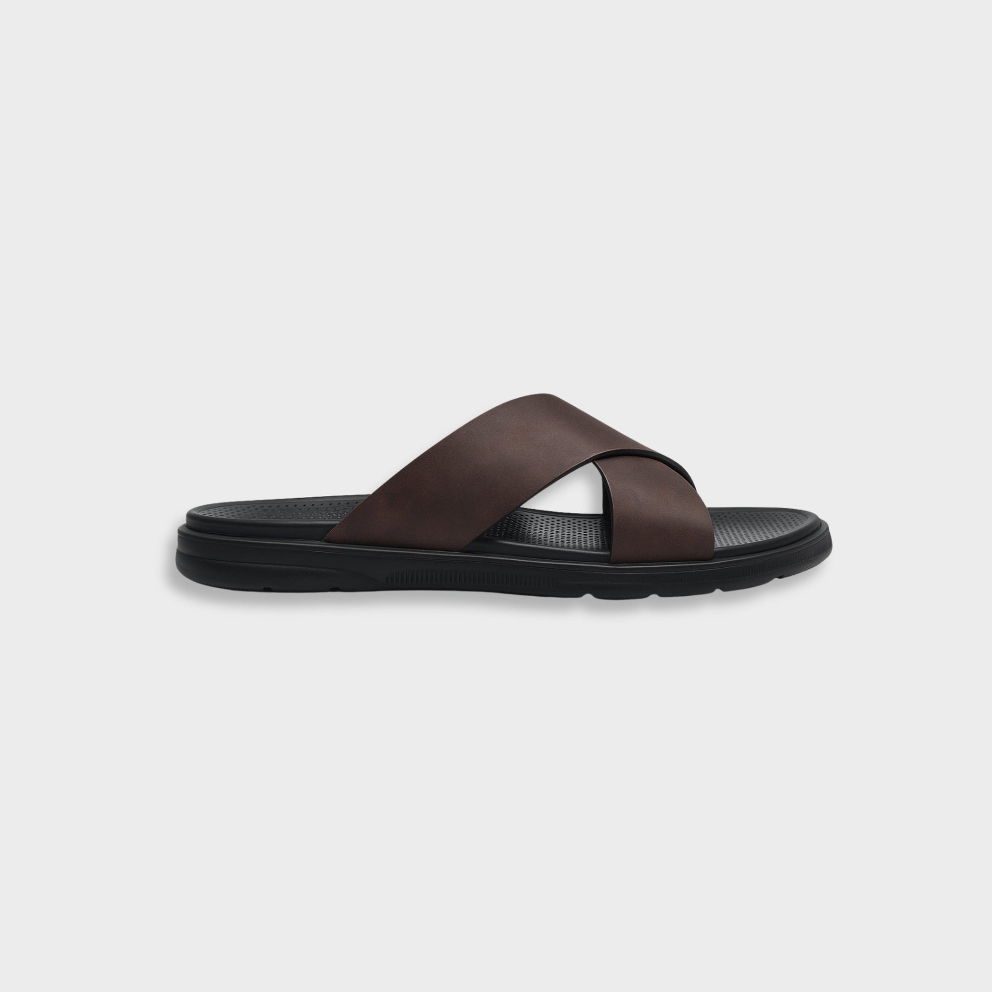 Men's brown NAXOS cross-strap sandal featuring a sleek minimalist design and contoured EVA footbed.