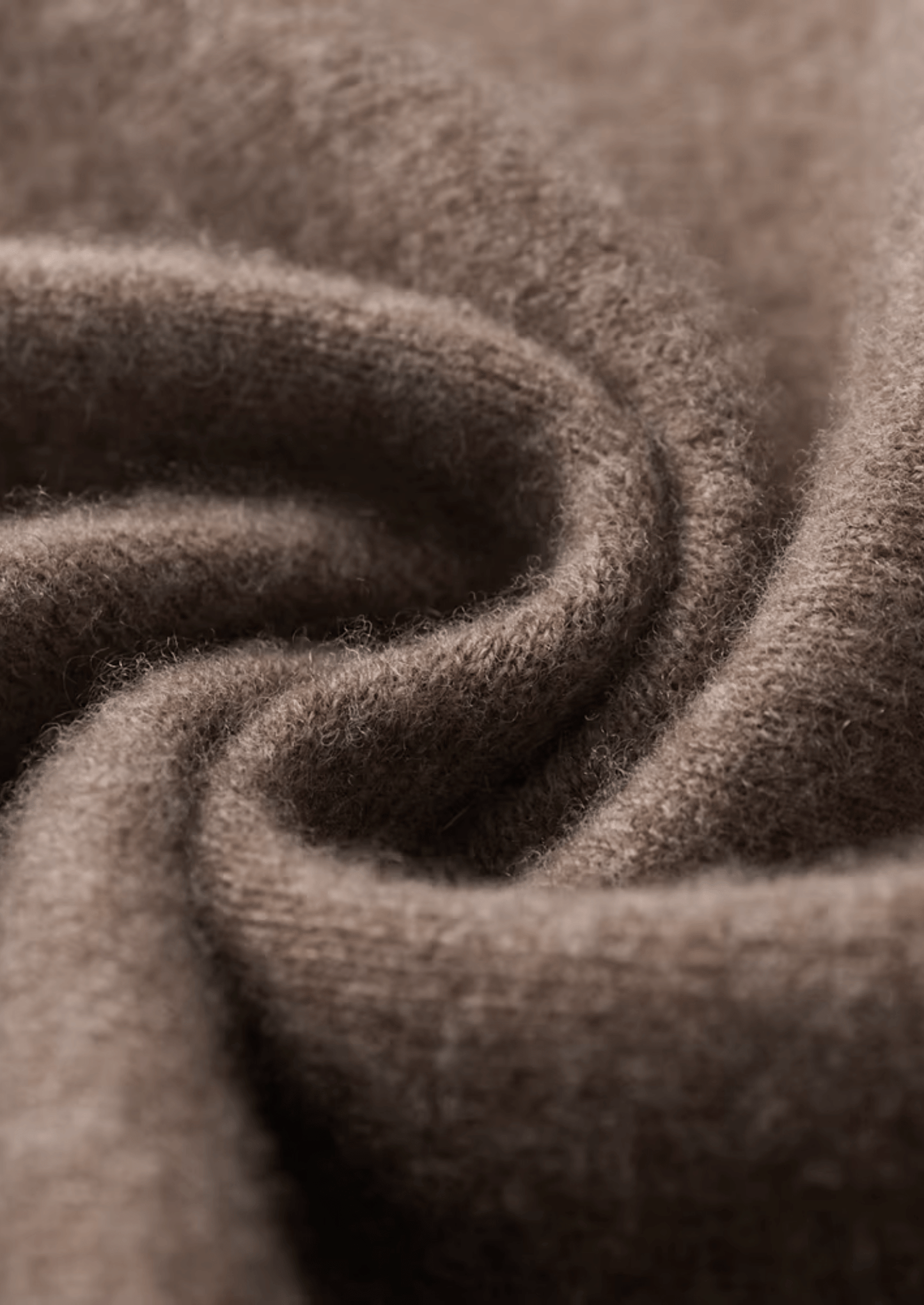 Close-up of brown fabric with a textured pattern