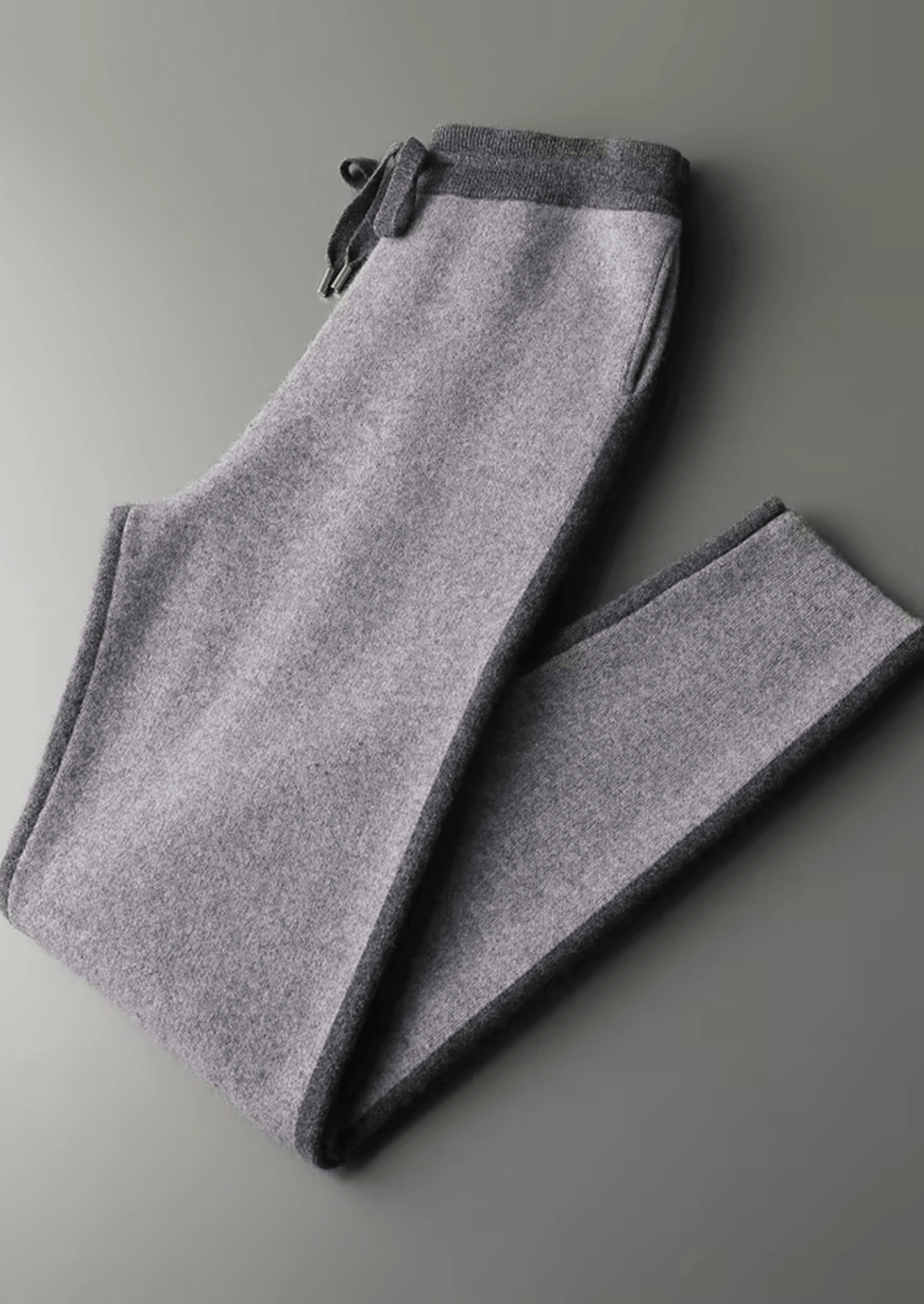 Gray sweatpants on a light gray background