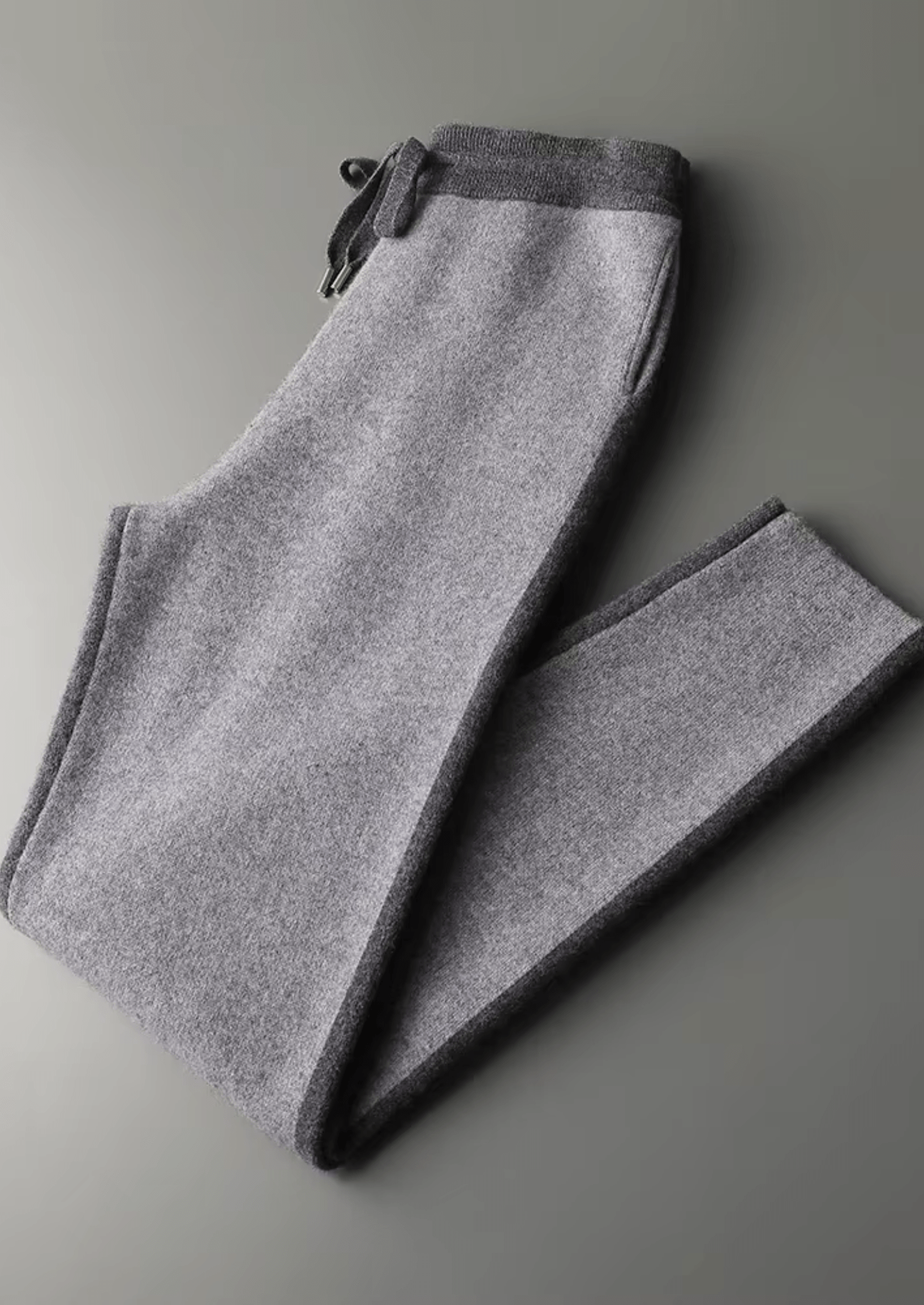 Gray sweatpants on a light gray background