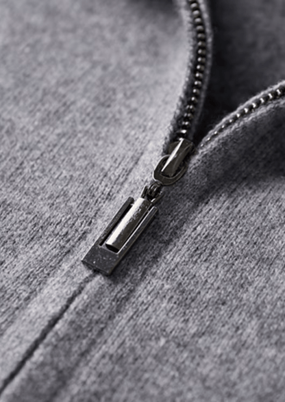 Close-up of a zipper on a gray hoodie