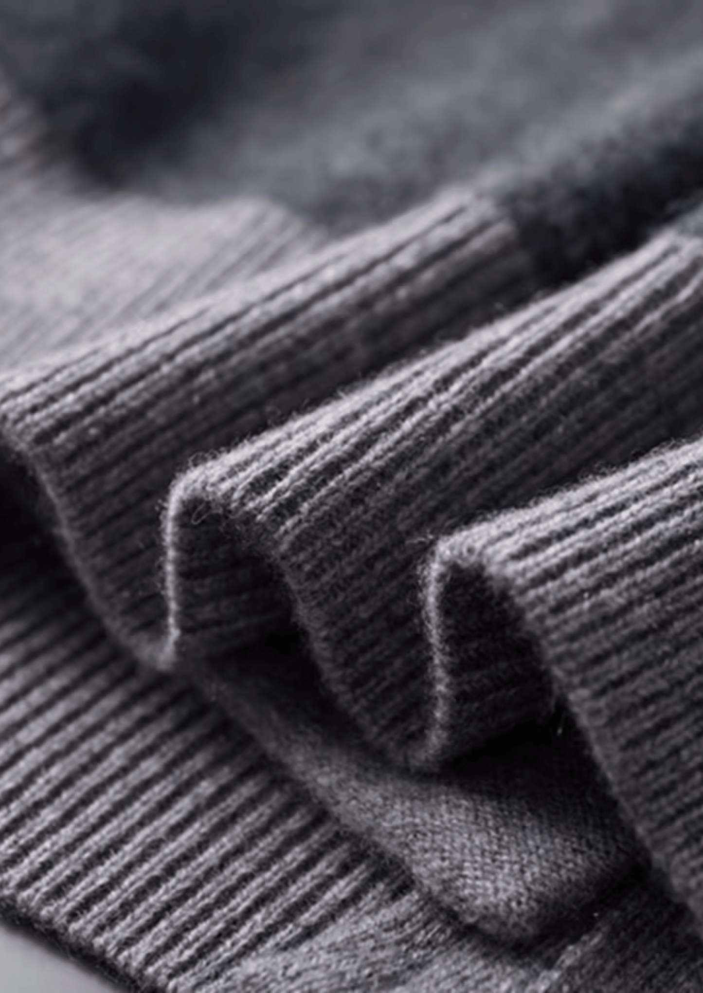 Close-up of gray ribbed knit fabric