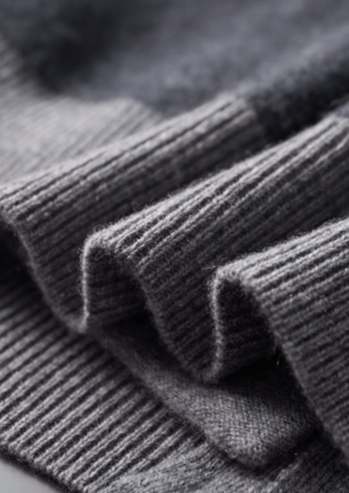 Close-up of gray ribbed knit fabric