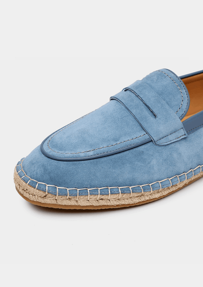 Blue suede Seaside Espadrille featuring a leather-trimmed collar and a traditional braided jute midsole with a thin rubber outer sole.