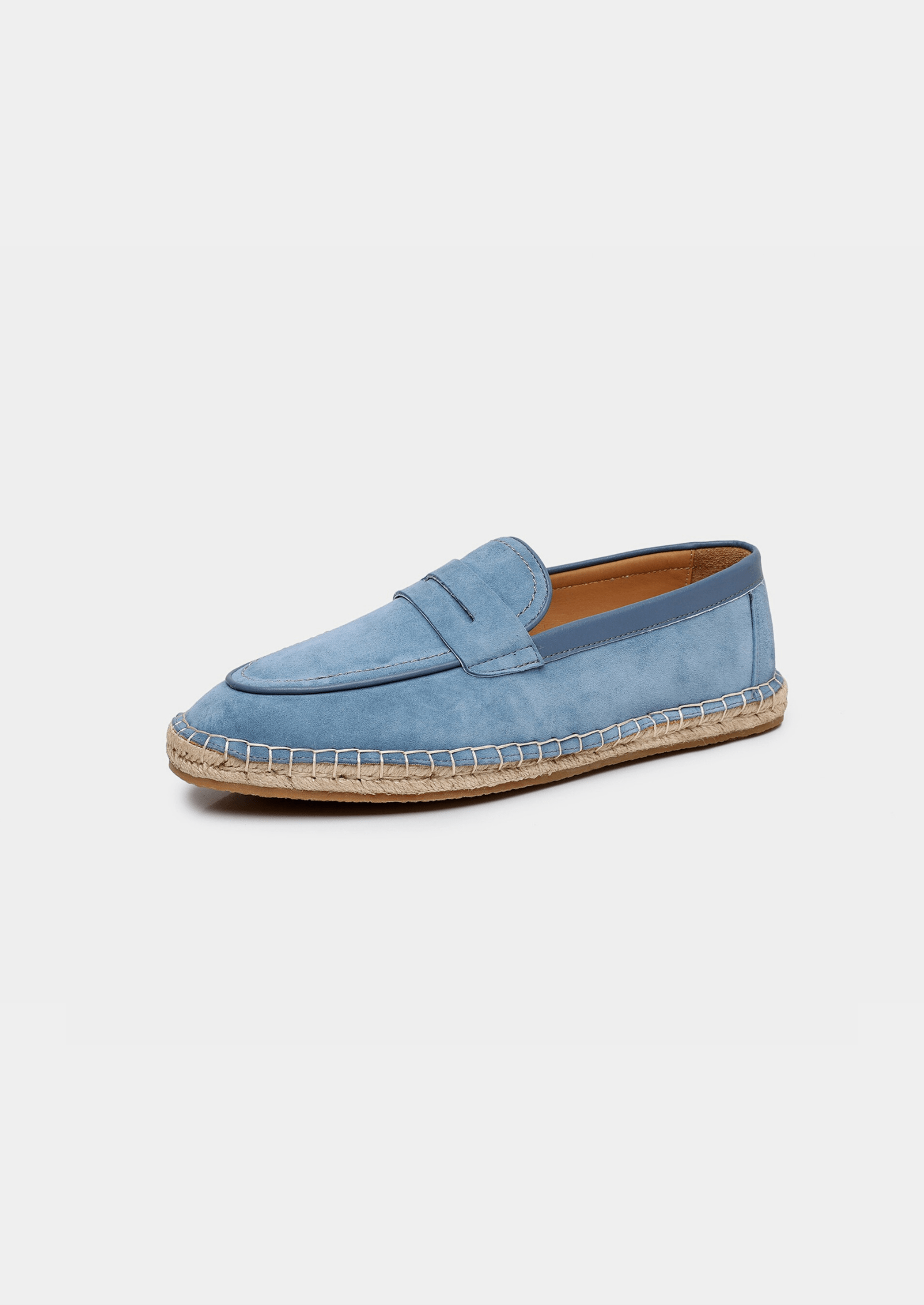 Blue espadrille shoe on a white background