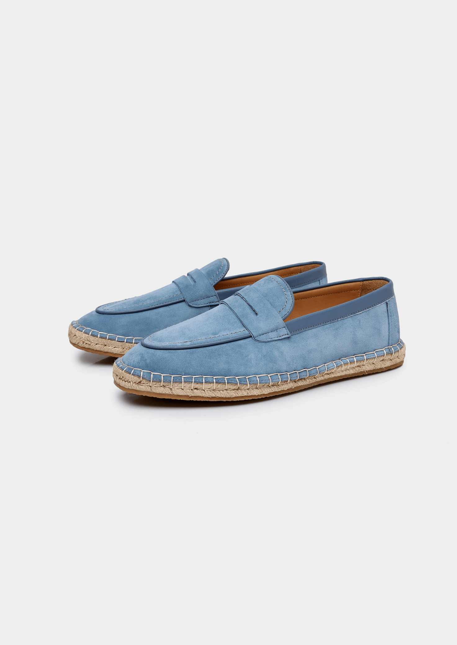 Blue suede Seaside Espadrille featuring a leather-trimmed collar and a traditional braided jute midsole with a thin rubber outer sole.