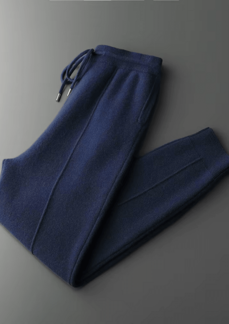 Men's navy blue 100% merino wool matching loungewear set featuring a full-zip ribbed collar cardigan and pintuck drawstring joggers.