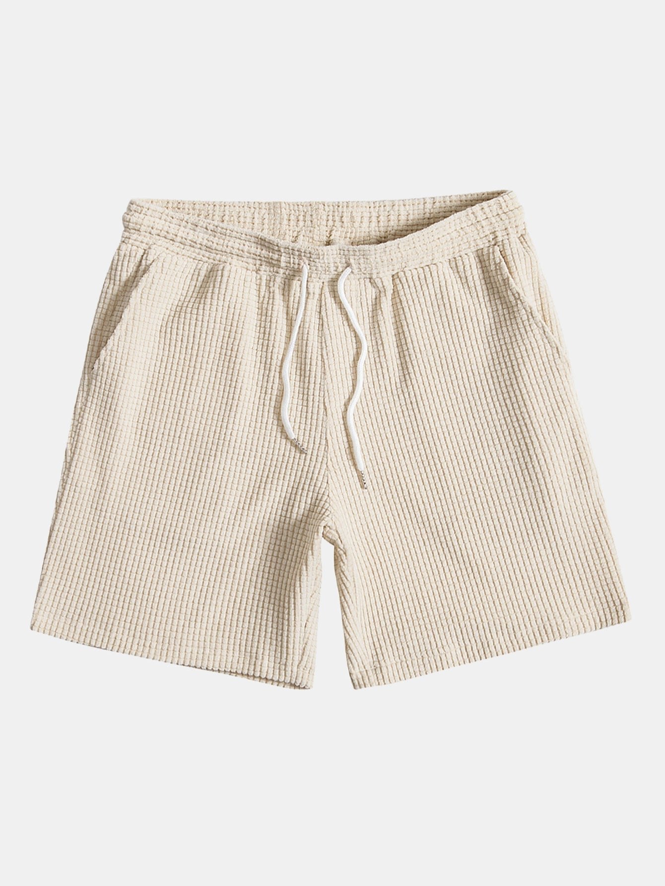 Beige shorts with a drawstring on a white background