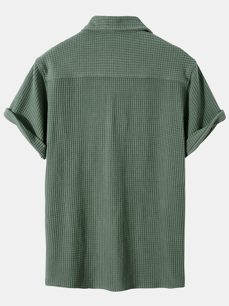 Green checkered shirt on a white background