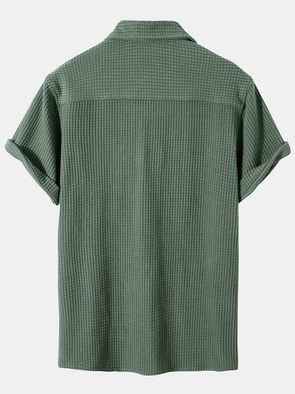 Green checkered shirt on a white background