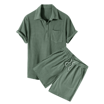 Green checkered shirt and shorts set on a white background