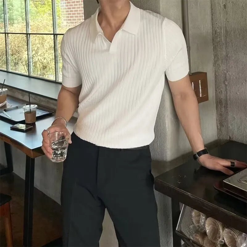 Men's white vertical ribbed short-sleeve polo with a classic spread collar and a tailored, high-end fit.