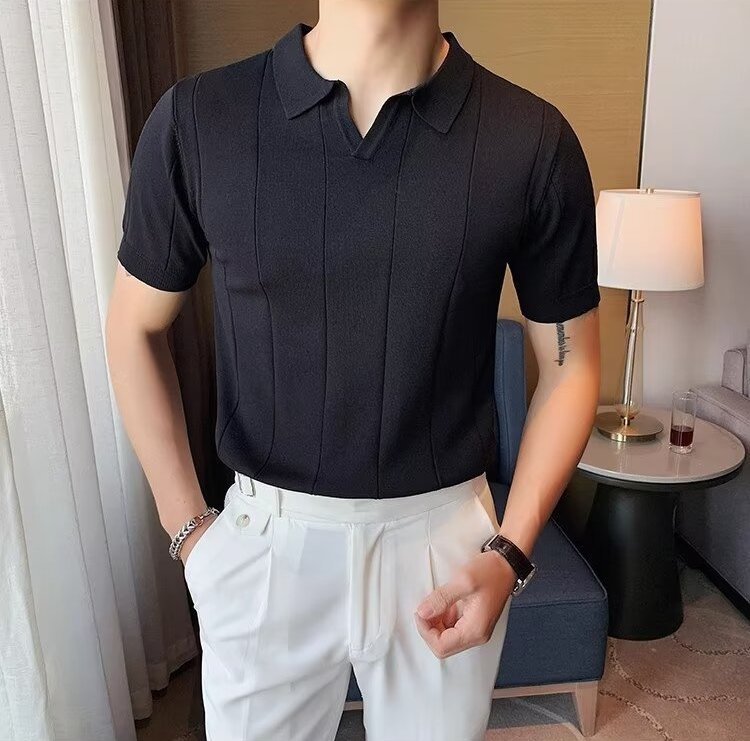 Premium Men's black vertical ribbed polo showcasing a streamlined linear design and a tailored, contemporary fit.