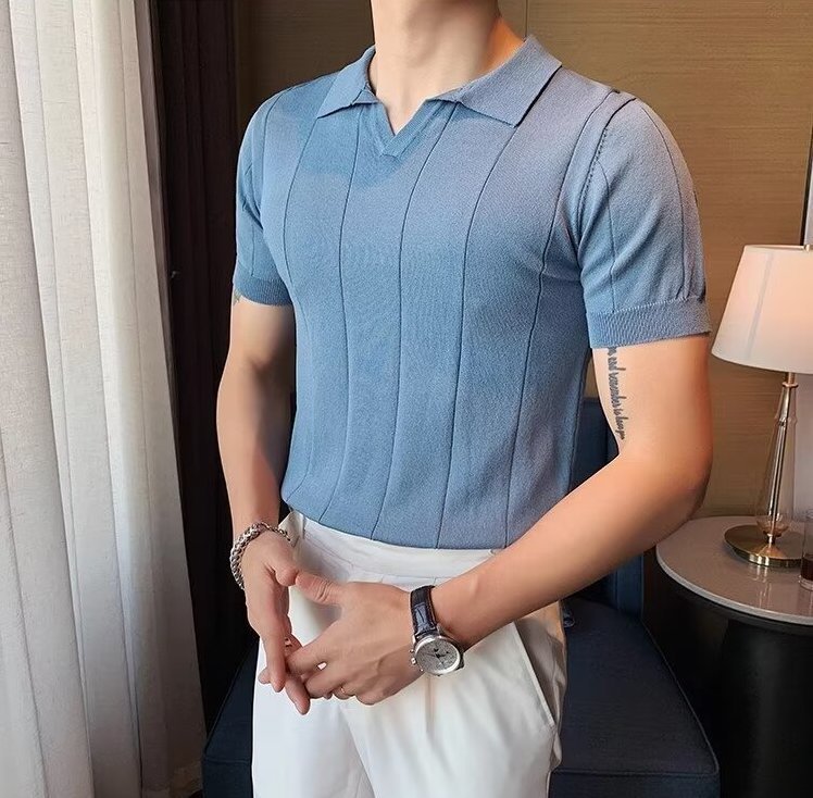 Men's light blue knitted polo featuring a sophisticated vertical ribbed texture and a clean, buttonless V-neckline.