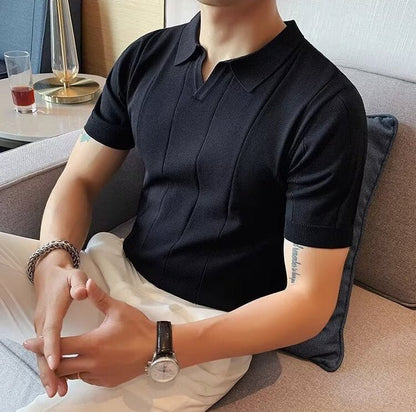 Premium Men's black vertical ribbed polo showcasing a streamlined linear design and a tailored, contemporary fit.