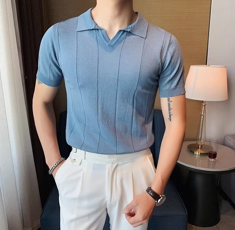 Men's light blue knitted polo featuring a sophisticated vertical ribbed texture and a clean, buttonless V-neckline.