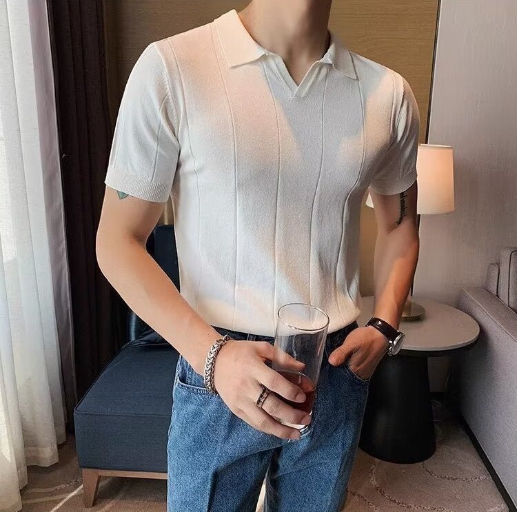 Men's crisp white premium knit polo showcasing a streamlined linear design and a tailored, high-end fit.