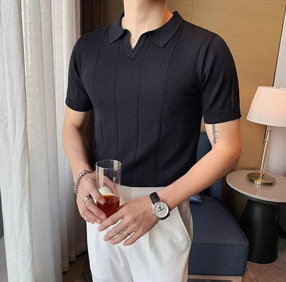 Premium Men's black vertical ribbed polo showcasing a streamlined linear design and a tailored, contemporary fit.