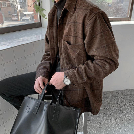 Men's brown loose-fit cotton overshirt featuring a premium brushed texture and sophisticated oversized drape.